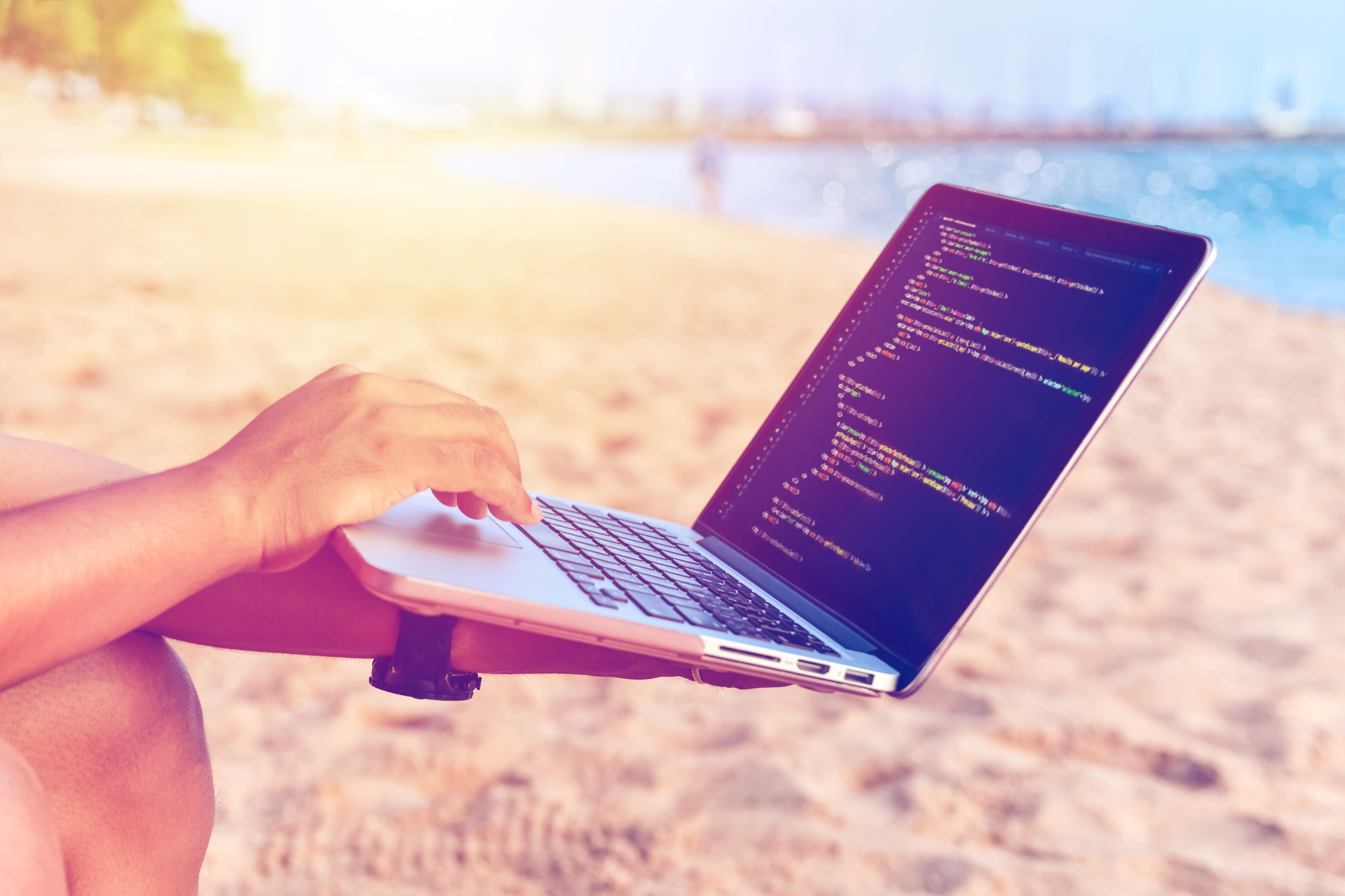 digital nomad on a beach