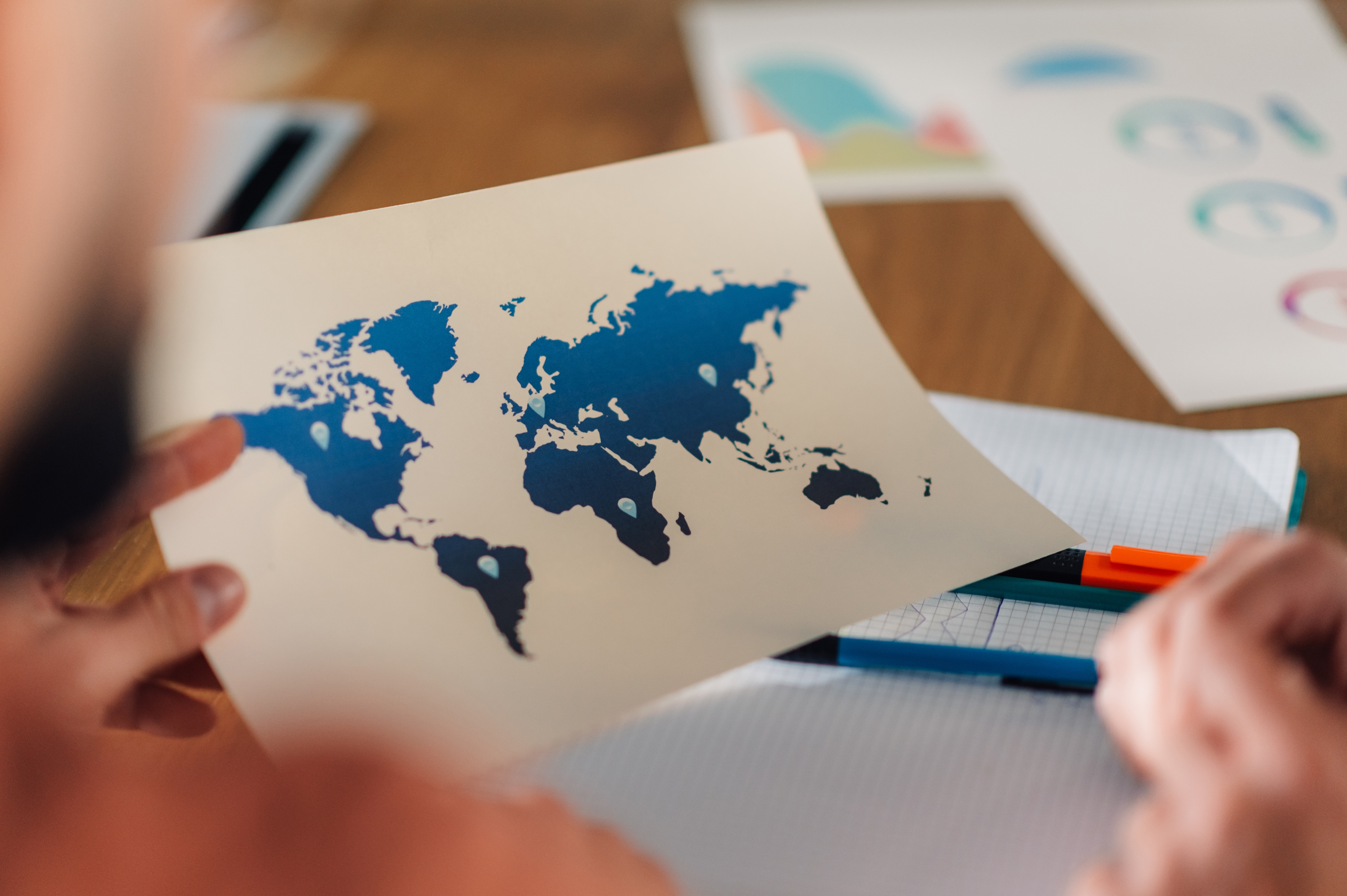 Businessman considering which foreign country offers best opportunity for growth